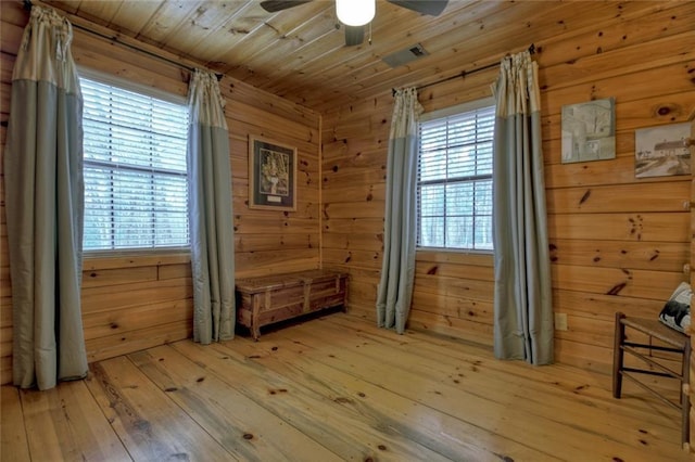 97 Doyle Carder Pkwy, Blue Ridge, GA 30513 - interior space with wood ceiling, wood walls, plenty of natural light, and light wood-style floors