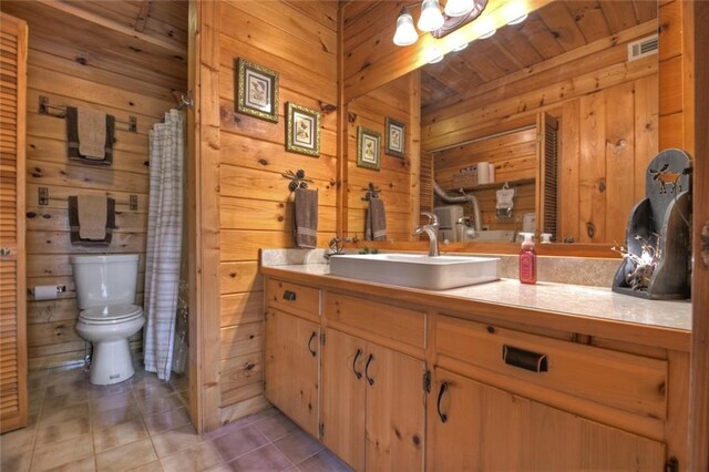 97 Doyle Carder Pkwy, Blue Ridge, GA 30513 - full bathroom featuring wooden walls, visible vents, toilet, tile patterned flooring, and vanity