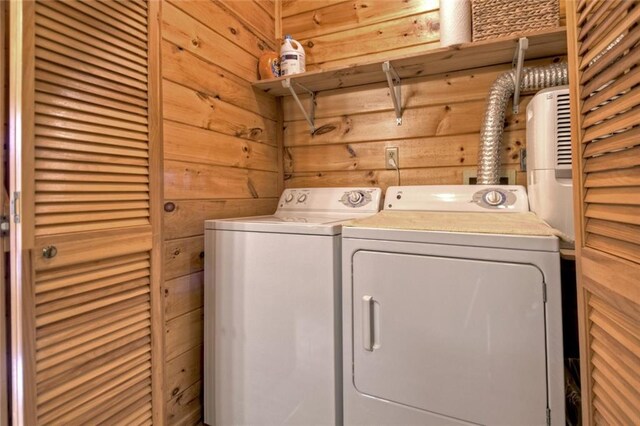 97 Doyle Carder Pkwy, Blue Ridge, GA 30513 - clothes washing area with laundry area, wood walls, and independent washer and dryer