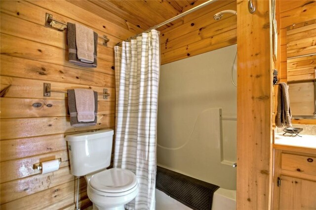 97 Doyle Carder Pkwy, Blue Ridge, GA 30513 - full bath with toilet, wood ceiling, shower / bathtub combination with curtain, vanity, and wood walls
