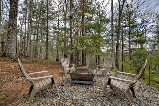 97 Doyle Carder Pkwy, Blue Ridge, GA 30513 - view of patio with an outdoor fire pit