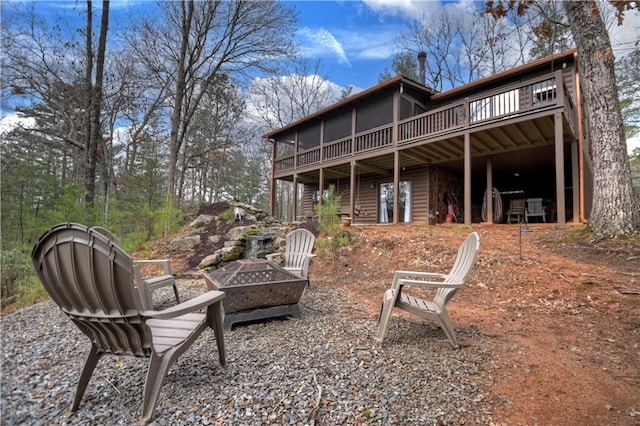 97 Doyle Carder Pkwy, Blue Ridge, GA 30513 - back of property featuring a fire pit and a deck