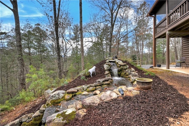 97 Doyle Carder Pkwy, Blue Ridge, GA 30513 - view of yard featuring a patio, a forest view, and a balcony