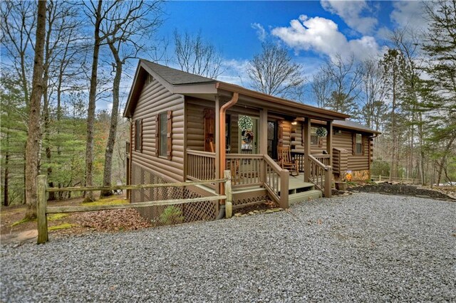 97 Doyle Carder Pkwy, Blue Ridge, GA 30513 - log home with driveway and covered porch