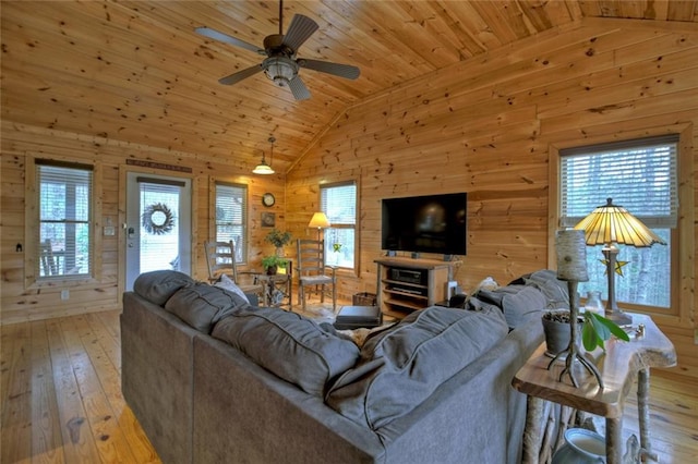 97 Doyle Carder Pkwy, Blue Ridge, GA 30513 - living room with vaulted ceiling, wood walls, ceiling fan, light wood-type flooring, and wooden ceiling