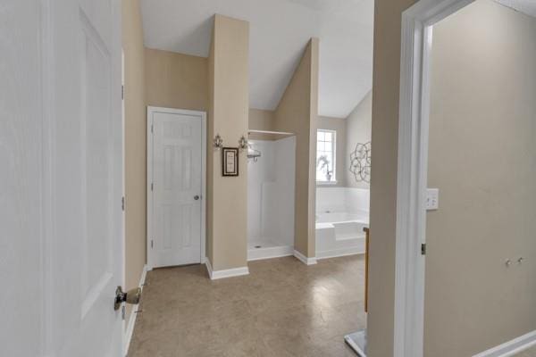 corridor featuring baseboards
