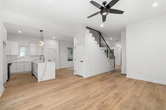 staircase featuring hardwood / wood-style flooring