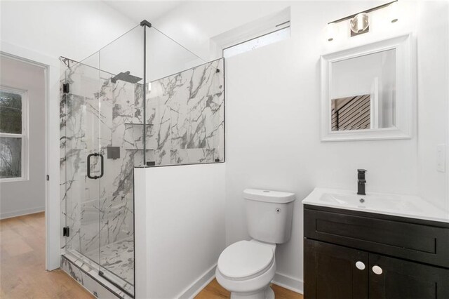 washroom with washer hookup, hookup for an electric dryer, and wood-type flooring