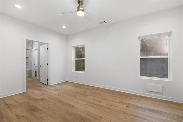 spacious closet featuring light hardwood / wood-style flooring