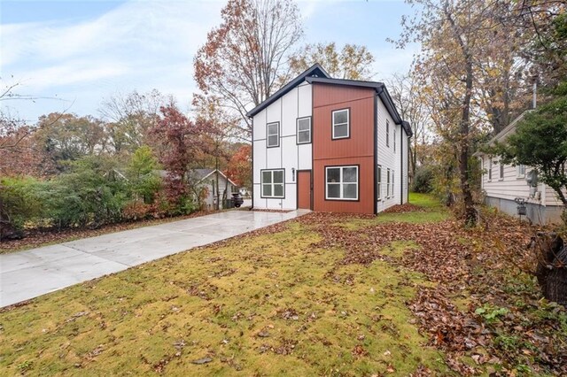 unfurnished living room with light hardwood / wood-style floors, heating unit, and ceiling fan