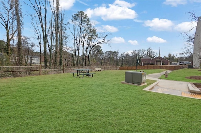 view of yard with a patio and fence