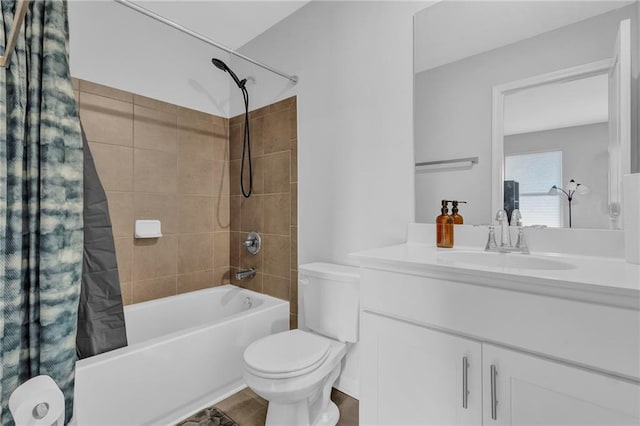 full bath featuring toilet, vanity, and shower / bathtub combination with curtain