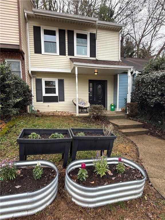 view of front of house with a vegetable garden