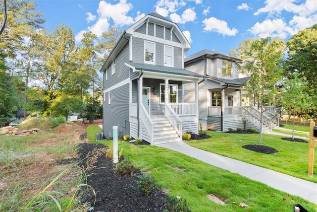 view of front facade featuring a porch and a front yard