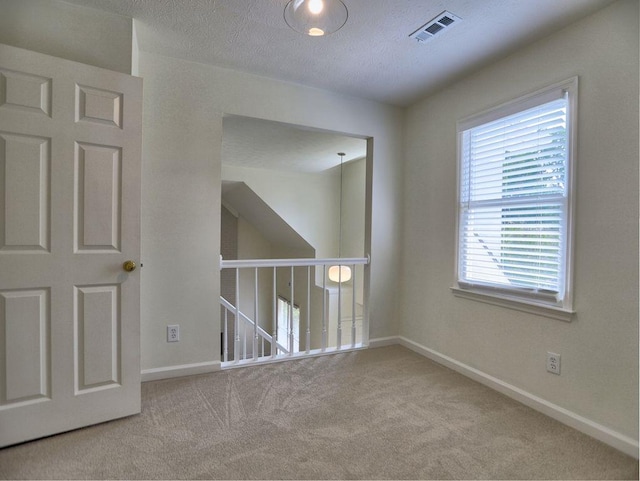 750 Whitehall Way, Roswell, GA 30076 - carpeted spare room with baseboards and a textured ceiling
