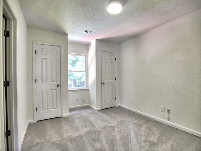 750 Whitehall Way, Roswell, GA 30076 - unfurnished bedroom with carpet and a textured ceiling