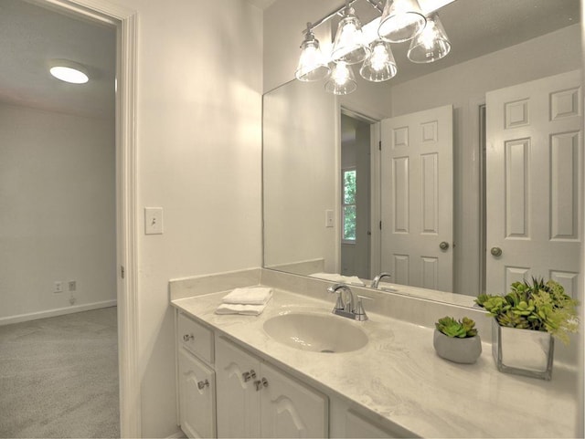 750 Whitehall Way, Roswell, GA 30076 - bathroom with vanity and a chandelier