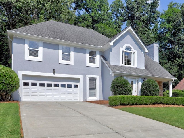 750 Whitehall Way, Roswell, GA 30076 - traditional-style house featuring an attached garage, driveway, stucco siding, roof with shingles, and a chimney