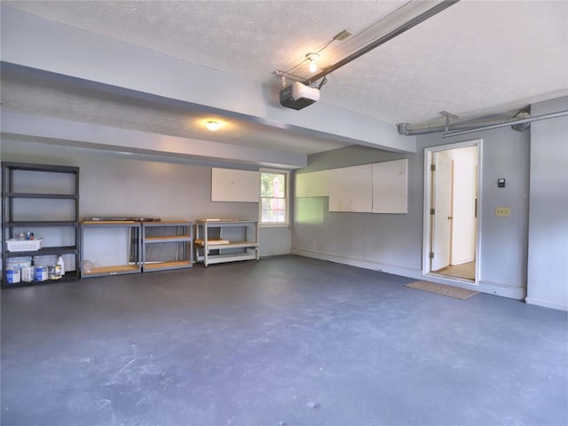 750 Whitehall Way, Roswell, GA 30076 - garage with a garage door opener and baseboards