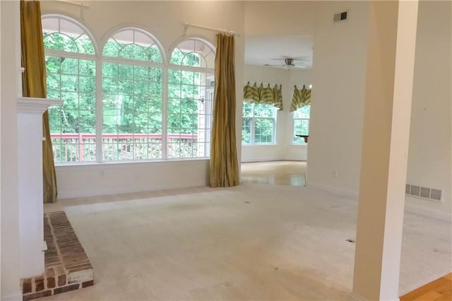 430 English Ivy Way, Woodstock, GA 30188 - unfurnished living room with a ceiling fan, carpet, and baseboards