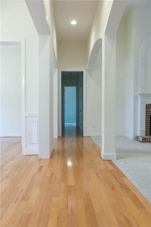 430 English Ivy Way, Woodstock, GA 30188 - corridor with light wood finished floors, recessed lighting, and arched walkways