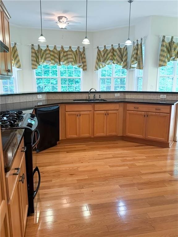 430 English Ivy Way, Woodstock, GA 30188 - kitchen featuring black appliances, a sink, and dark countertops