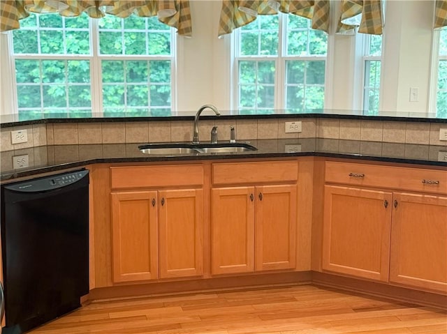 430 English Ivy Way, Woodstock, GA 30188 - kitchen with a sink, black dishwasher, dark stone countertops, and tasteful backsplash