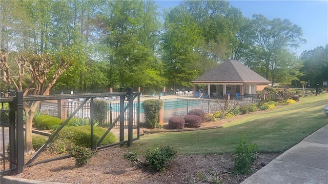 209 Southerness Ct, Stockbridge, GA 30281 - community pool featuring a gazebo, a lawn, and fence