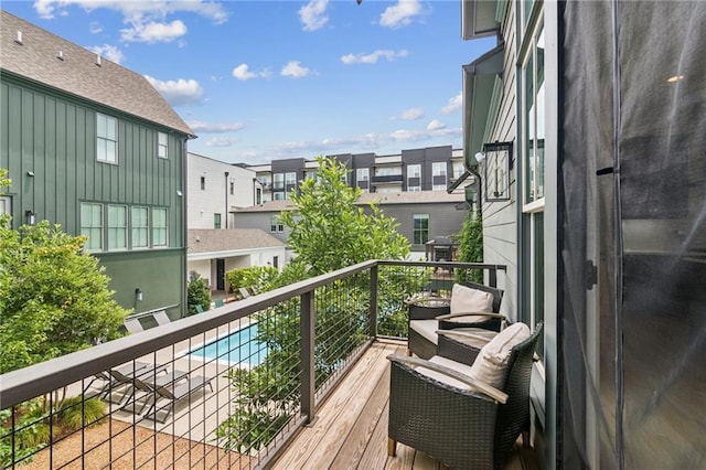 balcony featuring a residential view