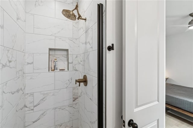 bathroom featuring a stall shower and ensuite bath