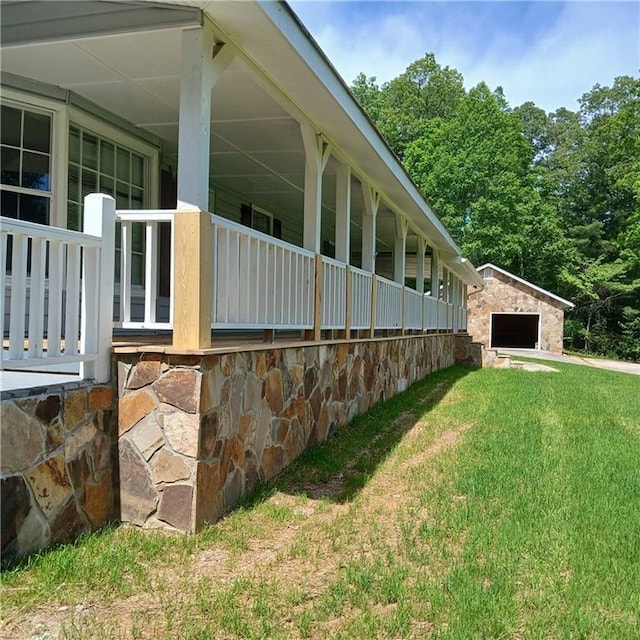 7203 Murphy Hwy, Mineral Bluff, GA 30559 - view of side of home featuring a yard, a garage, and a porch