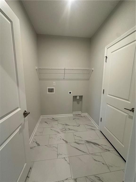861 Pineberry Ct, Grayson, GA 30017 - laundry room featuring hookup for an electric dryer, hookup for a washing machine, and light marble finish floors