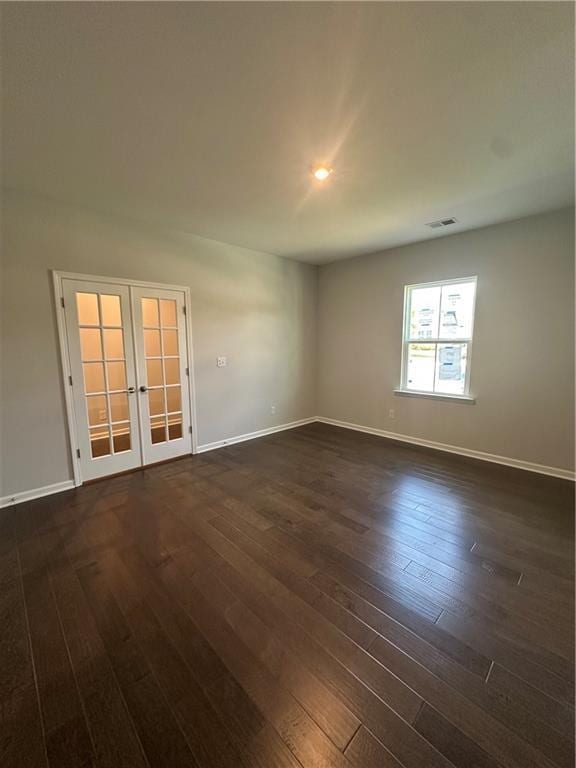861 Pineberry Ct, Grayson, GA 30017 - unfurnished room with french doors, dark wood-style floors, and recessed lighting