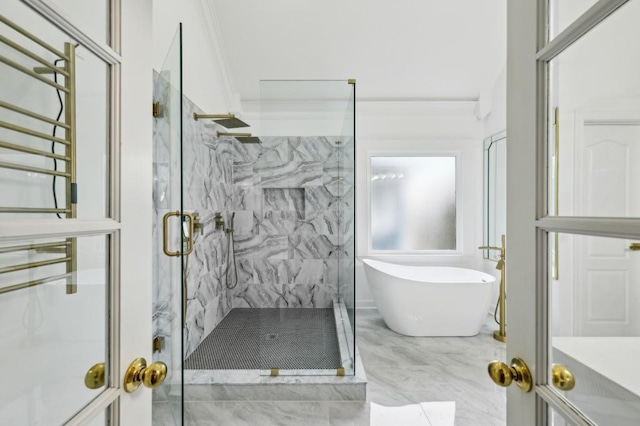 bathroom featuring crown molding and independent shower and bath