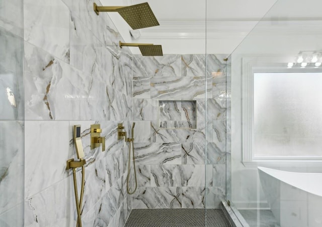 bathroom with a tile shower