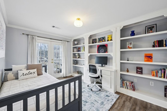 bedroom with crown molding, dark wood-type flooring, and french doors