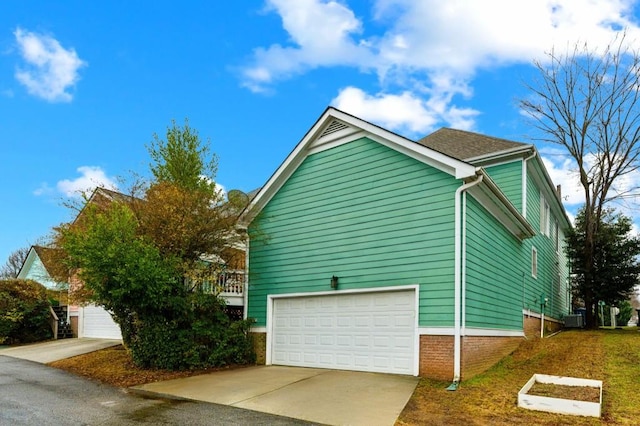 view of property exterior featuring a garage