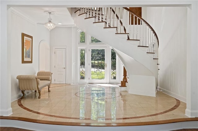 4340 Candacraig, Johns Creek, GA 30022 - foyer entrance featuring baseboards, inlaid floor details, a chandelier, stairs, and marble tiled floors
