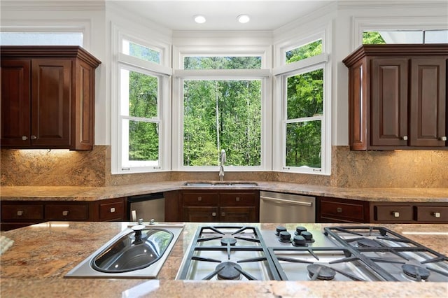 4340 Candacraig, Johns Creek, GA 30022 - kitchen featuring dishwasher, a sink, stovetop, dark brown cabinetry, and ornamental molding
