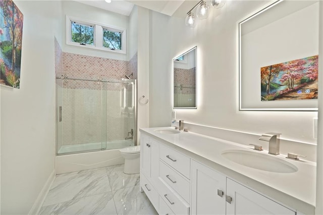 4340 Candacraig, Johns Creek, GA 30022 - full bath with shower / bath combination with glass door, toilet, double vanity, marble look tile flooring, and baseboards