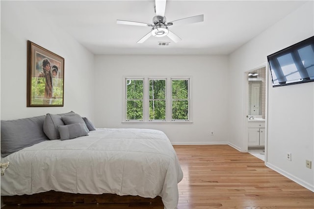4340 Candacraig, Johns Creek, GA 30022 - bedroom with multiple windows, light wood-type flooring, baseboards, and ensuite bath