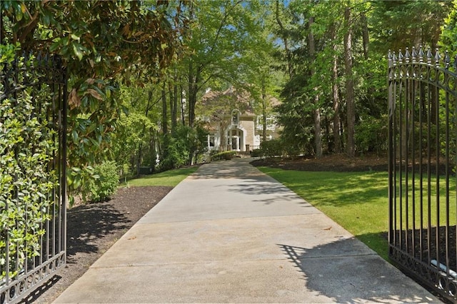 4340 Candacraig, Johns Creek, GA 30022 - view of community with a lawn and a gate
