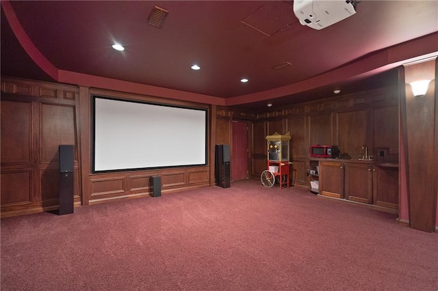 4340 Candacraig, Johns Creek, GA 30022 - home theater room with light carpet, recessed lighting, a decorative wall, a sink, and wood walls