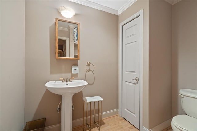 4340 Candacraig, Johns Creek, GA 30022 - half bath with toilet, crown molding, baseboards, and wood finished floors