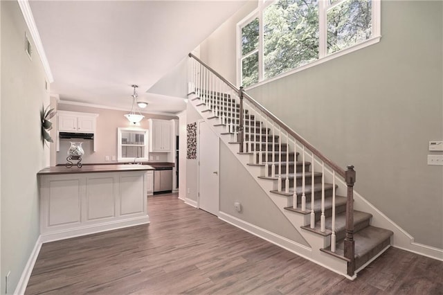 4340 Candacraig, Johns Creek, GA 30022 - staircase featuring wood finished floors, ornamental molding, and baseboards