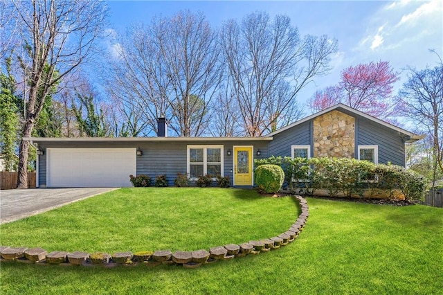 view of front of home featuring a garage, a front yard, stone siding, and driveway