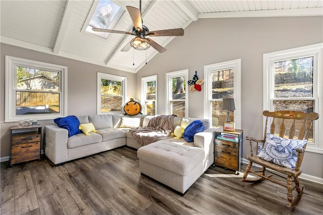 living area with a textured ceiling, a fireplace, wood finished floors, visible vents, and crown molding