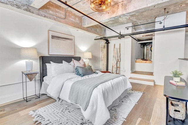 bedroom with wood finished floors