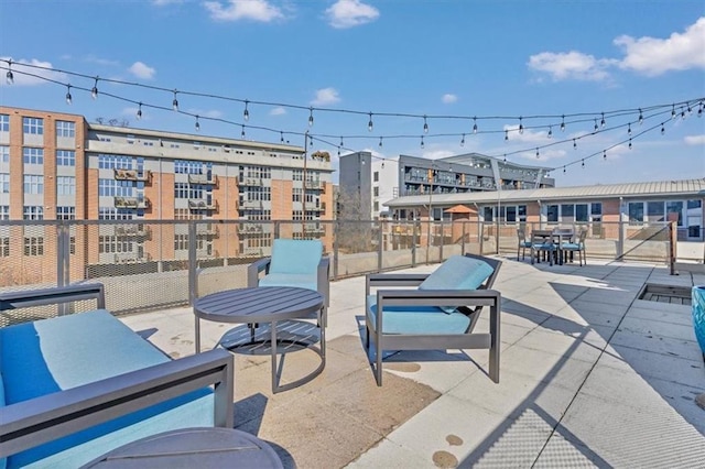 view of patio featuring fence