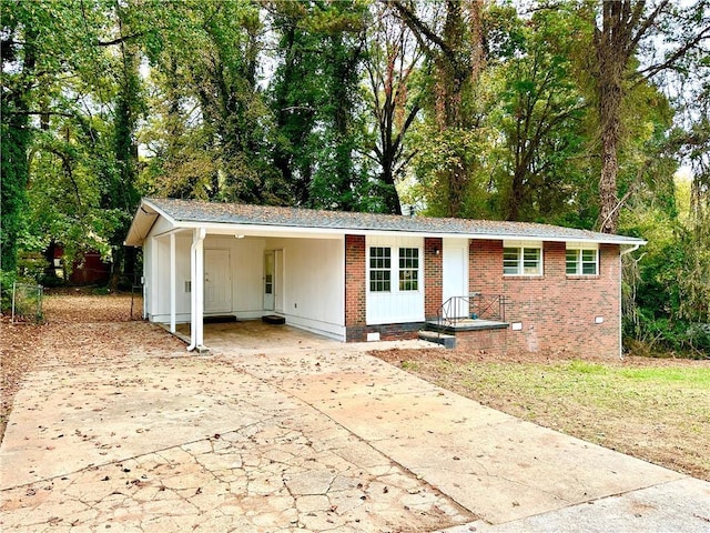 ranch-style house with a carport